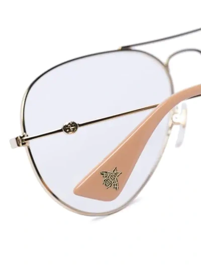 Shop Gucci Aviator Glasses In Gold