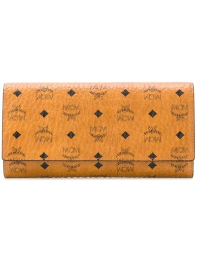 Shop Mcm Visetos Three Fold Wallet In Brown