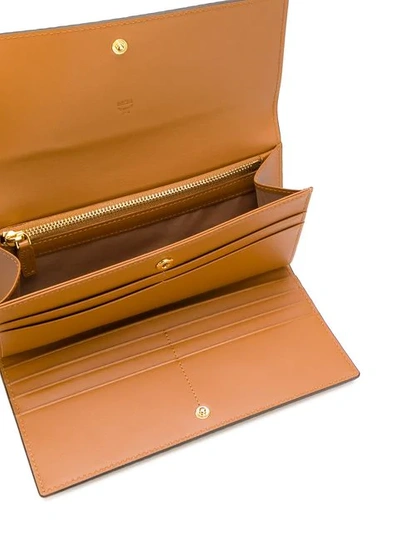 Shop Mcm Visetos Three Fold Wallet In Brown