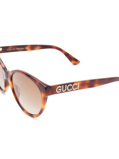 Shop Gucci Cat Eye Frame Sunglasses In Brown