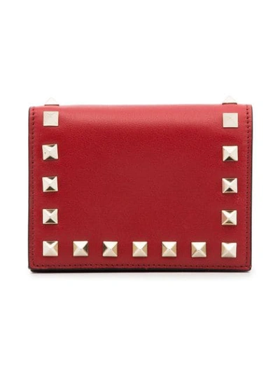 red rockstud fold over leather wallet