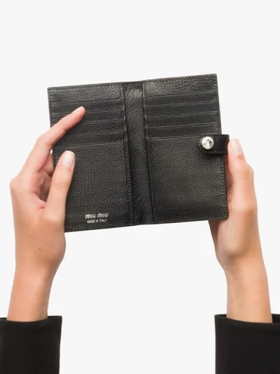 Shop Miu Miu Madras Wallet In Black