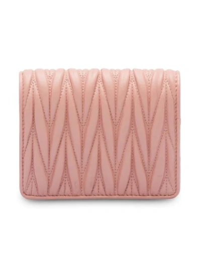 Shop Miu Miu Matelassé Embellished Logo Wallet In Pink