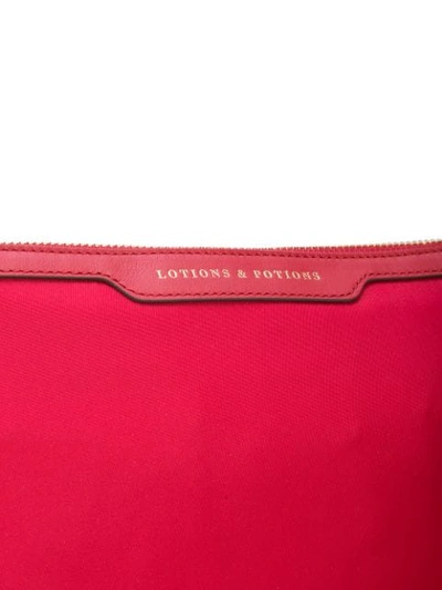 Shop Anya Hindmarch Lotions And Potions Wash Bag In Red