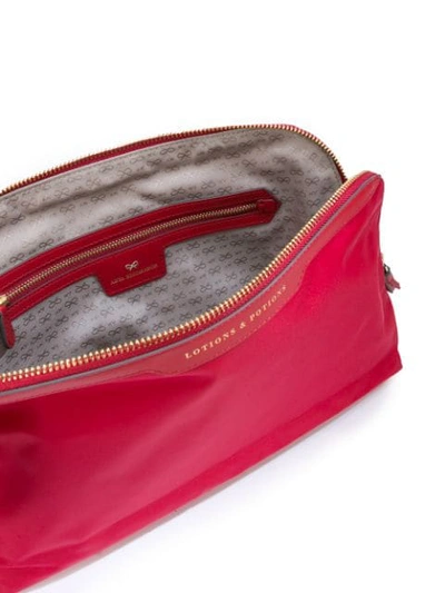 Shop Anya Hindmarch Lotions And Potions Wash Bag In Red