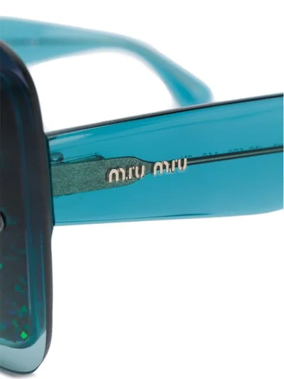 Shop Miu Miu Oversized Glitter Sunglasses In Green