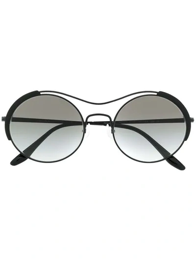 Shop Prada Round Sunglasses In Black