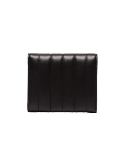 Shop Saint Laurent Triple Fold Quilted Leather Purse In 1000 Black