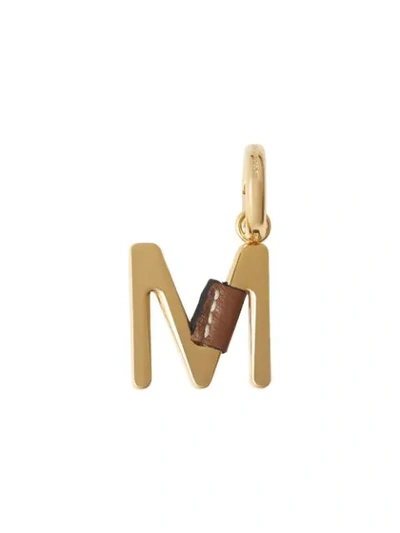 Shop Burberry Leather-wrapped ‘m' Charm In Gold
