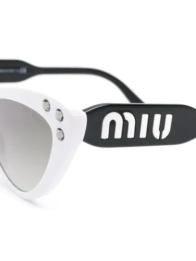 Shop Miu Miu Cat Eye Sunglasses In Black