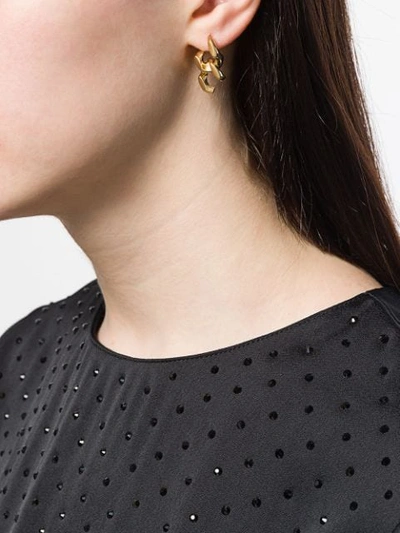 Shop Annelise Michelson Tiny Dechainee Earrings In Gold