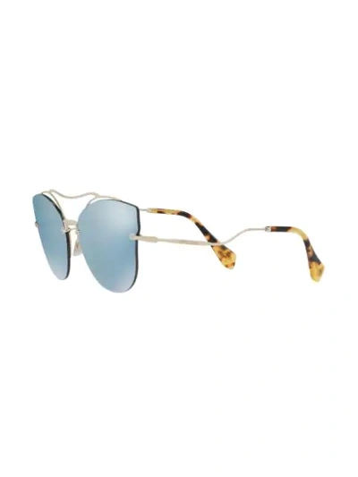 Shop Miu Miu Scenique Sunglasses In Gold