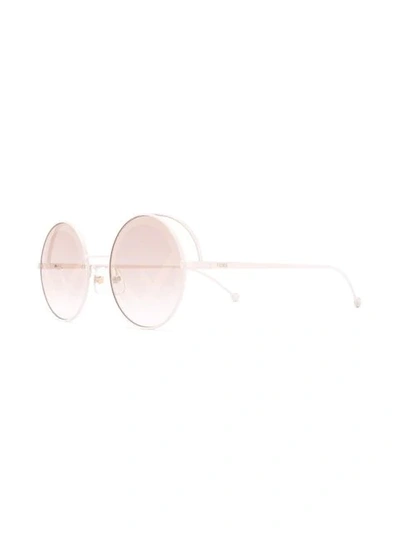 Shop Fendi Rama Round Frame Sunglasses In White