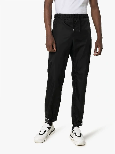 Shop Prada Elasticated Cuff Trousers In Black