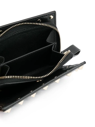 Shop Valentino Rockstud Zipped Wallet In Black