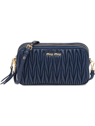 Shop Miu Miu Matelassé Make Up Bag In Blue