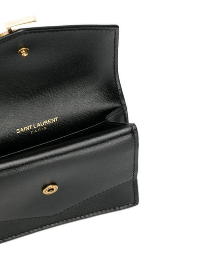 Shop Saint Laurent Small Sulpice Wallet In Black