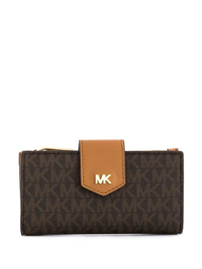 Shop Michael Michael Kors Logo Print Wallet In Brown