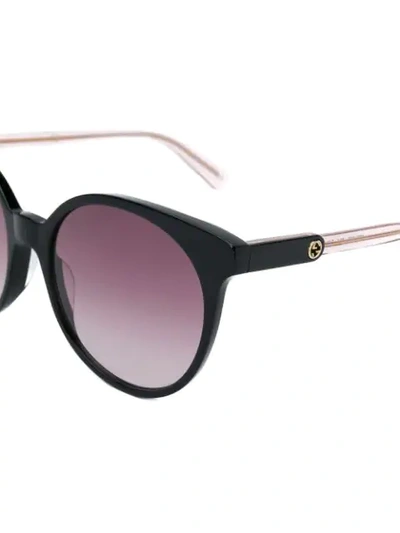 Shop Gucci Monogram Sunglasses In 004 Black