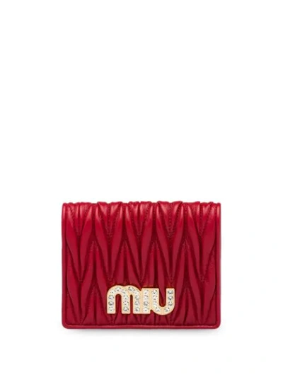 Shop Miu Miu Matelassé Embellished Logo Wallet In Red
