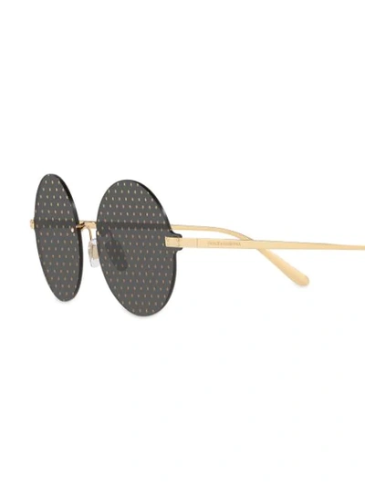 Shop Dolce & Gabbana Eyewear Round Frame Polka Dot Sunglasses - Black
