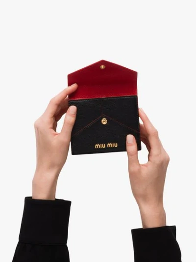 Shop Miu Miu Love Lovo Envelope Pouch In Black