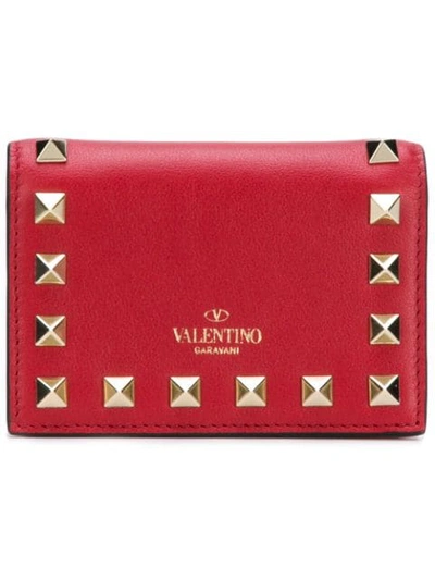Shop Valentino Garavani Compact Rockstud Wallet In Red