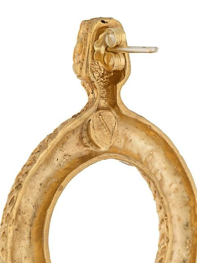 Shop Natia X Lako Round Snake Earrings In Gold