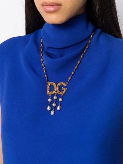 Shop Dolce & Gabbana Logo Pendant Necklace In Gold