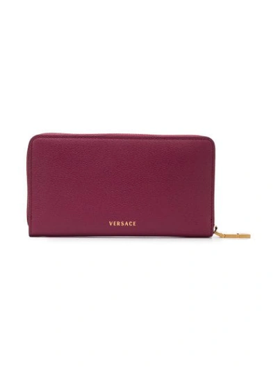 Shop Versace Zipped Medusa Wallet In Pink