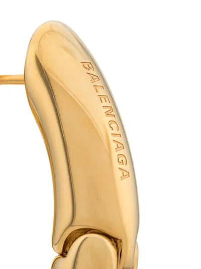 Shop Balenciaga Loop Earrings In Gold