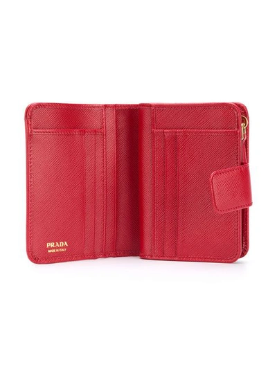 Shop Prada Small Saffiano Wallet In F068z Red