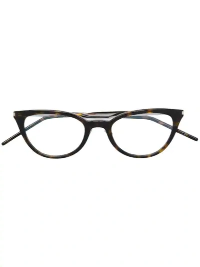 Shop Saint Laurent Cat Eye Glasses In Brown