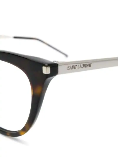 Shop Saint Laurent Cat Eye Glasses In Brown