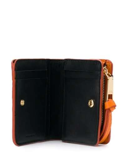 Shop Marc Jacobs Mini The Softshot Compact Wallet In 840 Kumquat