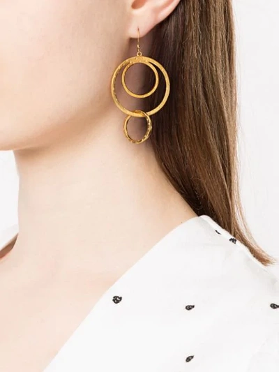 Shop Kenneth Jay Lane Triple Hoop Earrings In Gold