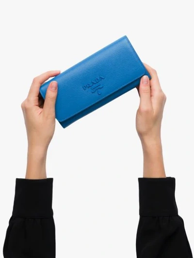 Shop Prada Large Logo Plaque Wallet In Blue