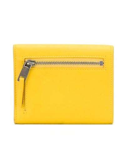 Shop Givenchy 4g Trifold Wallet - Yellow
