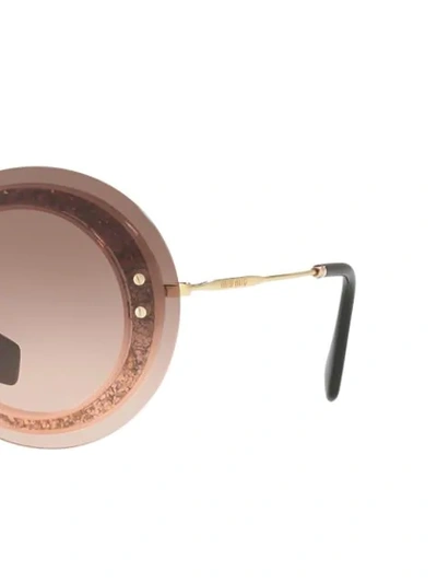 Shop Miu Miu Reveal Glitter Sunglasses In Pink