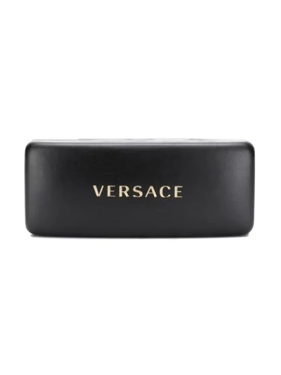 Shop Versace Round Sunglasses In Black