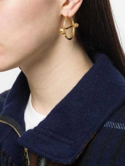 Shop Jw Anderson Disc Hoop Earrings In Gold