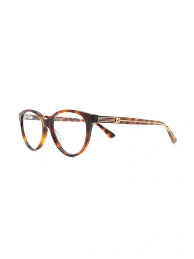 Shop Gucci Cat Eye Frame Glasses In 003 Brown