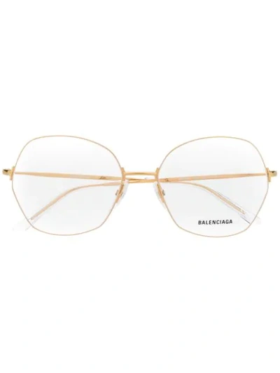 Shop Balenciaga Oversized Geometric Glasses In Gold