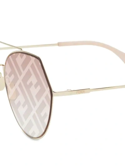 Shop Fendi Monogram Sunglasses In Gold