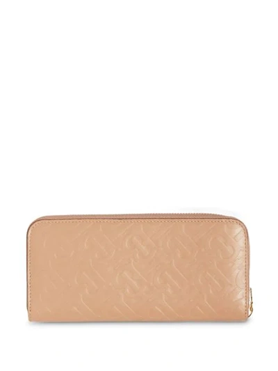 Shop Burberry Monogram Leather Ziparound Wallet In Brown
