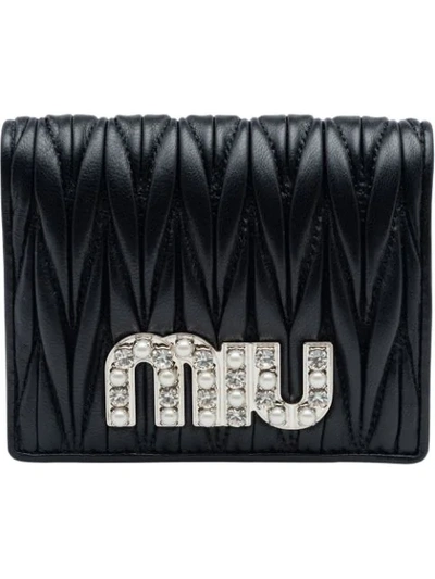 Shop Miu Miu Quilted Logo Bi-fold Wallet In Black