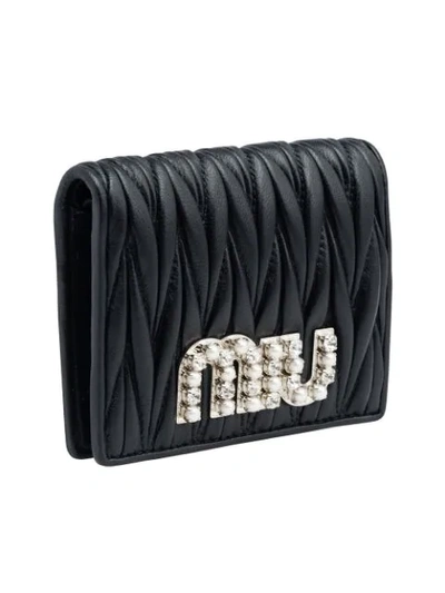 Shop Miu Miu Quilted Logo Bi-fold Wallet In Black