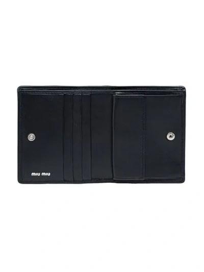 Shop Miu Miu Quilted Logo Bi-fold Wallet In Black