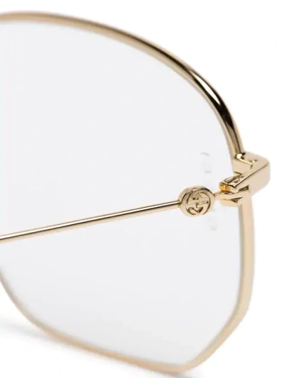 Shop Gucci Gold Transparent Lens Squoval Glasses