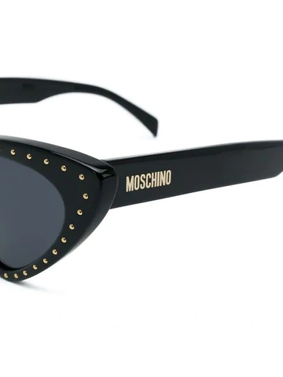 Shop Moschino Eyewear Sonnenbrille Mit Nieten In Black
